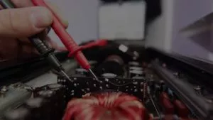 electrical contractor using electrical tools for repair